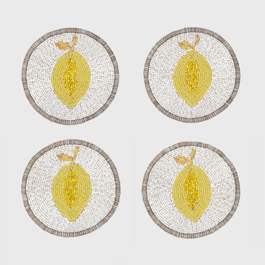 set of lemon coasters on table